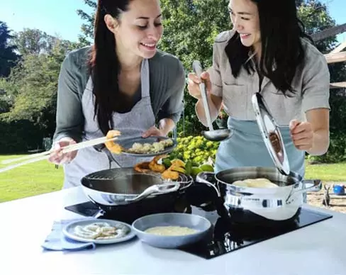 stainless steel cookware set are using in garden